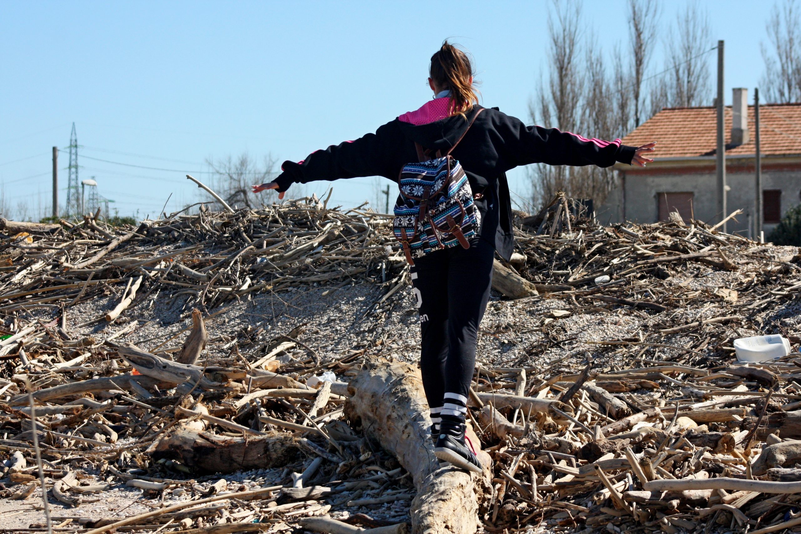 girl-waste-scrap-tree-disaster-rubble-1434807-pxhere.com -scaled